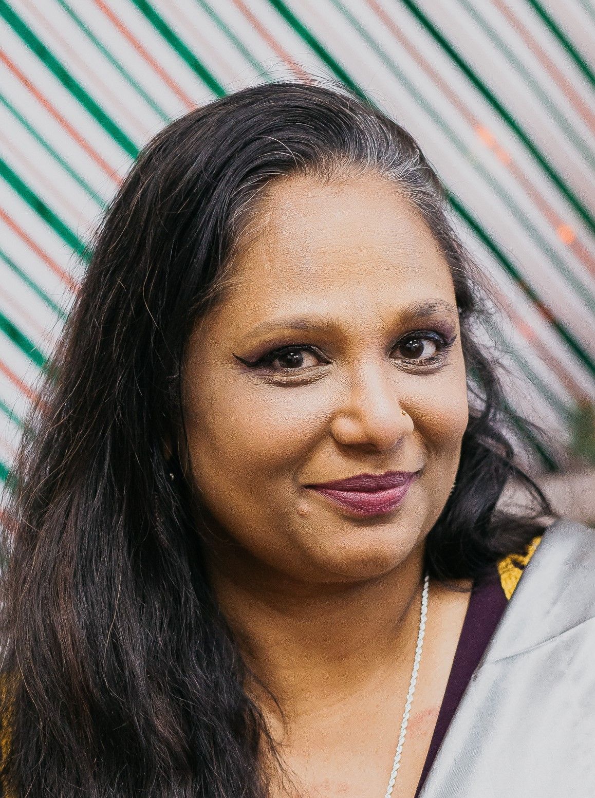 Indira M, MD